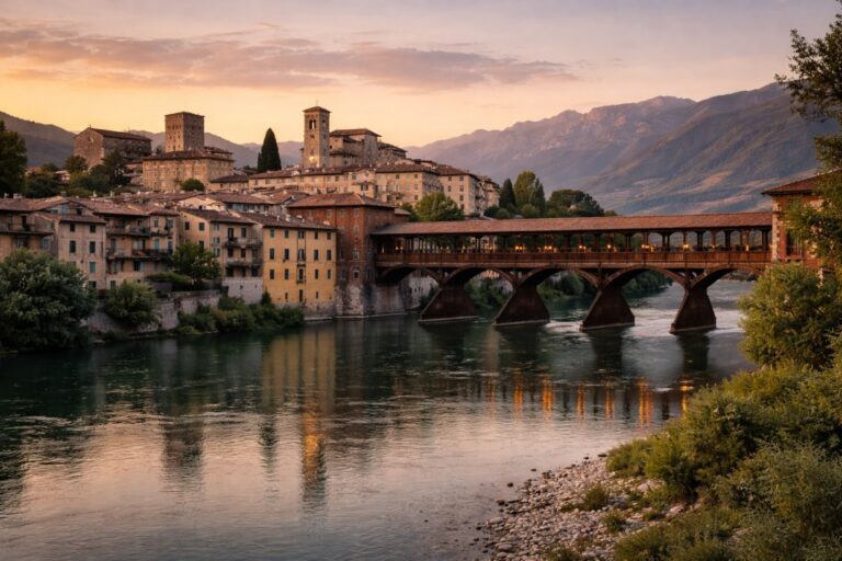 Ponte degli Alpini in Bassano del Grappa spanning the Brenta River with Monte Grappa in the background.
