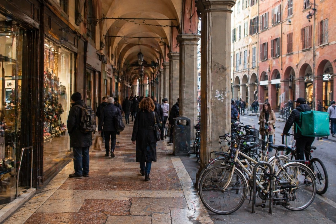 Centro Storico in Bologna, Italy – pedestrians under dense central porticoes