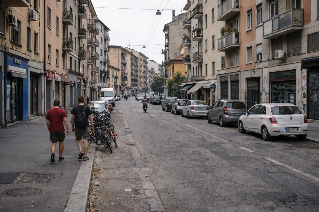 Lambrate in Milan, Italy – mixed residential street with shops, cars, and everyday use