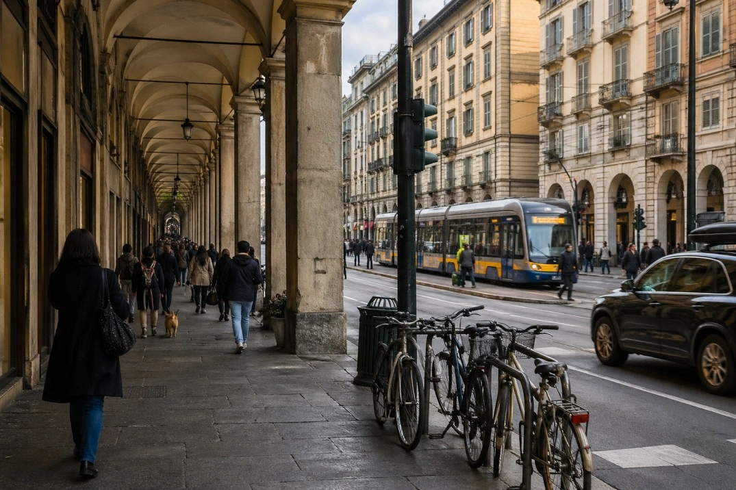 Living in Torino, Italy – people walking under porticoes on a normal weekday street