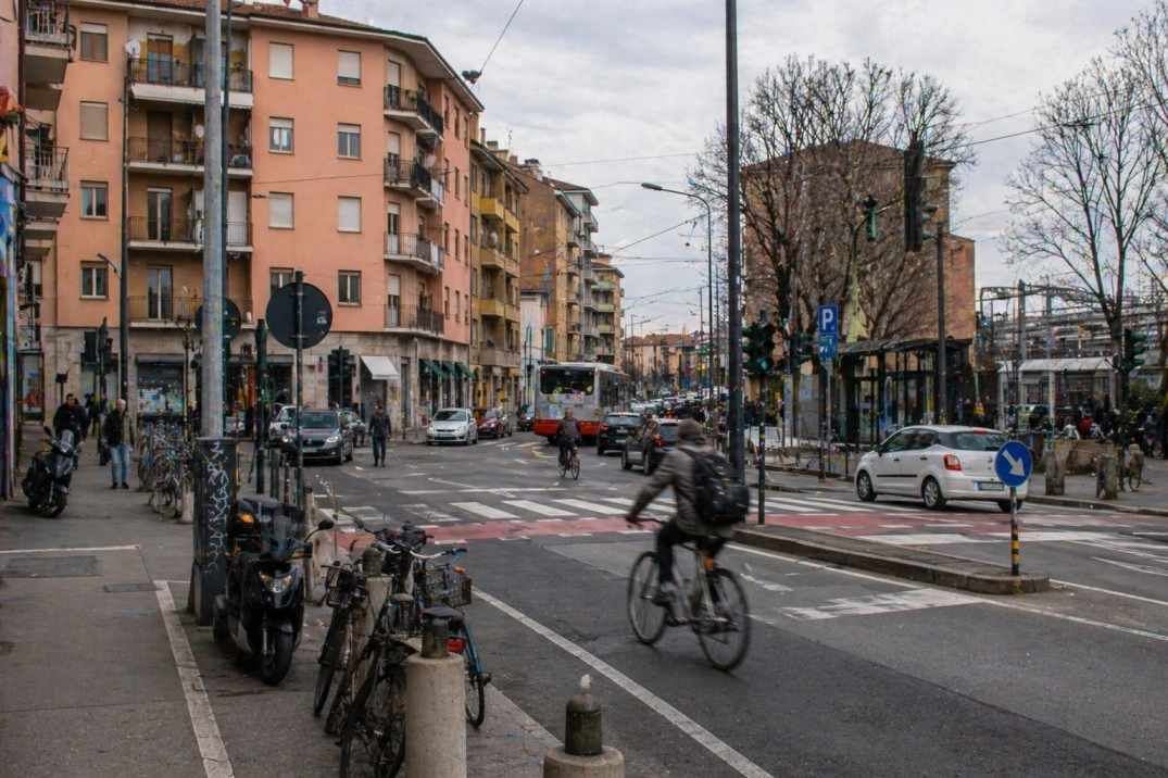 Navile in Bologna, Italy – practical station-adjacent street with traffic and cyclists