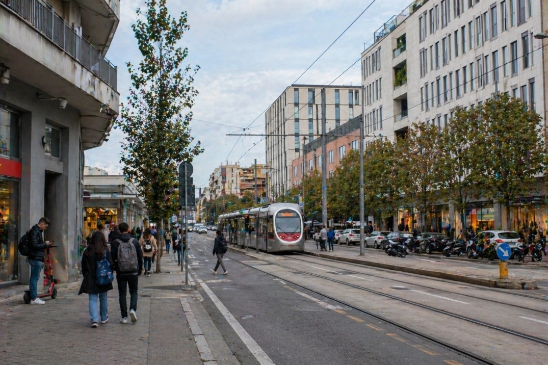 Novoli in Florence, Italy – modern tram-side street with students and workers
