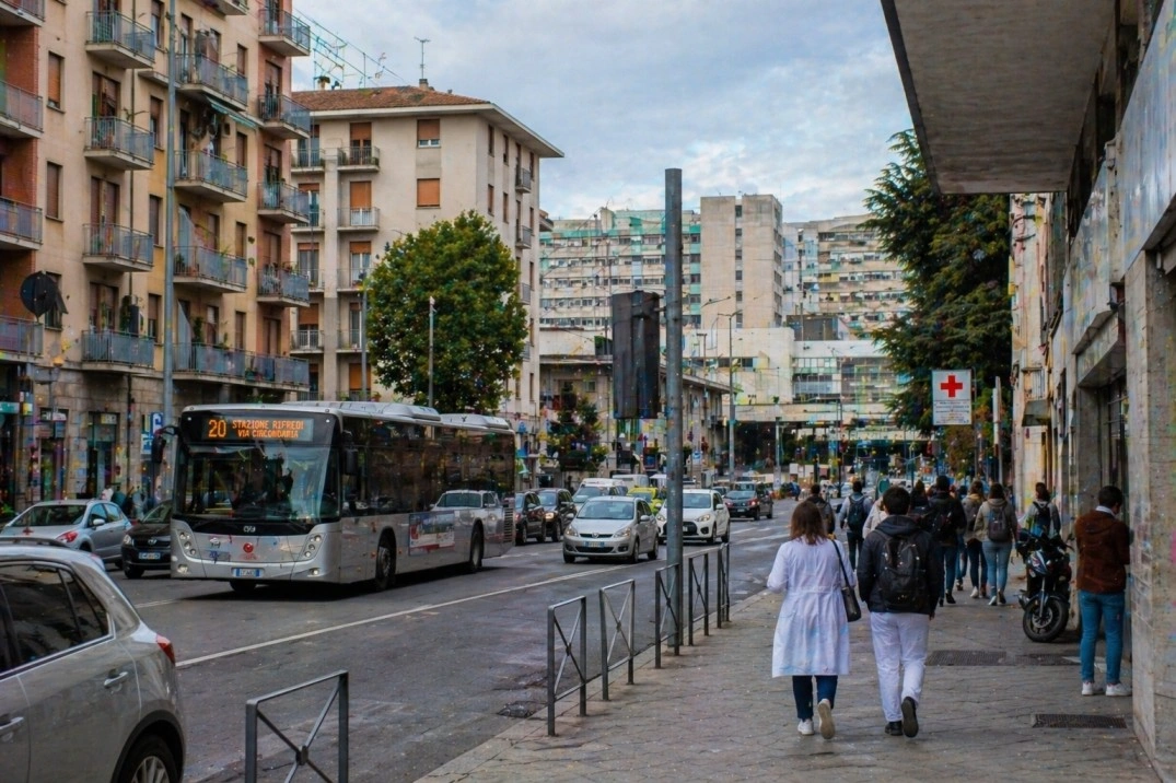 Rifredi in Florence, Italy – northern hospital-university street with commuters