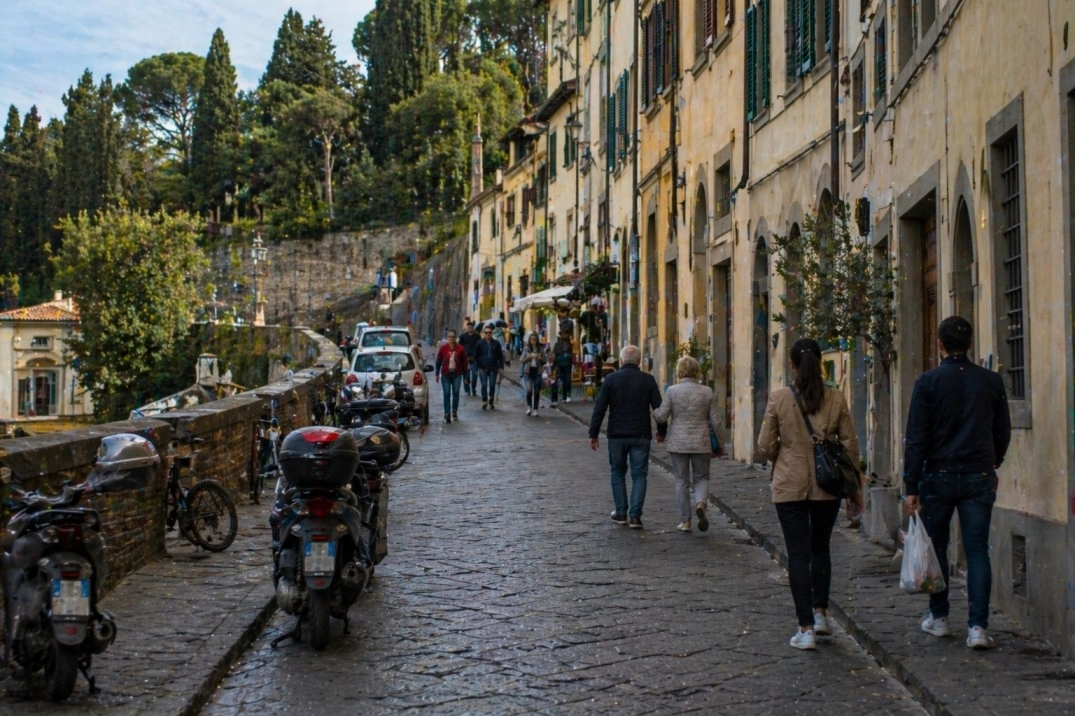 San Niccolò in Florence, Italy – hill-edge street with scooters and pedestrians