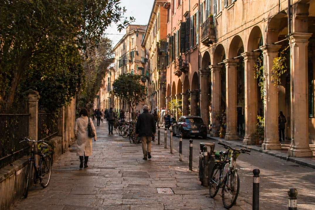Santo Stefano in Bologna, Italy – calm residential street with porticoes and pedestrians
