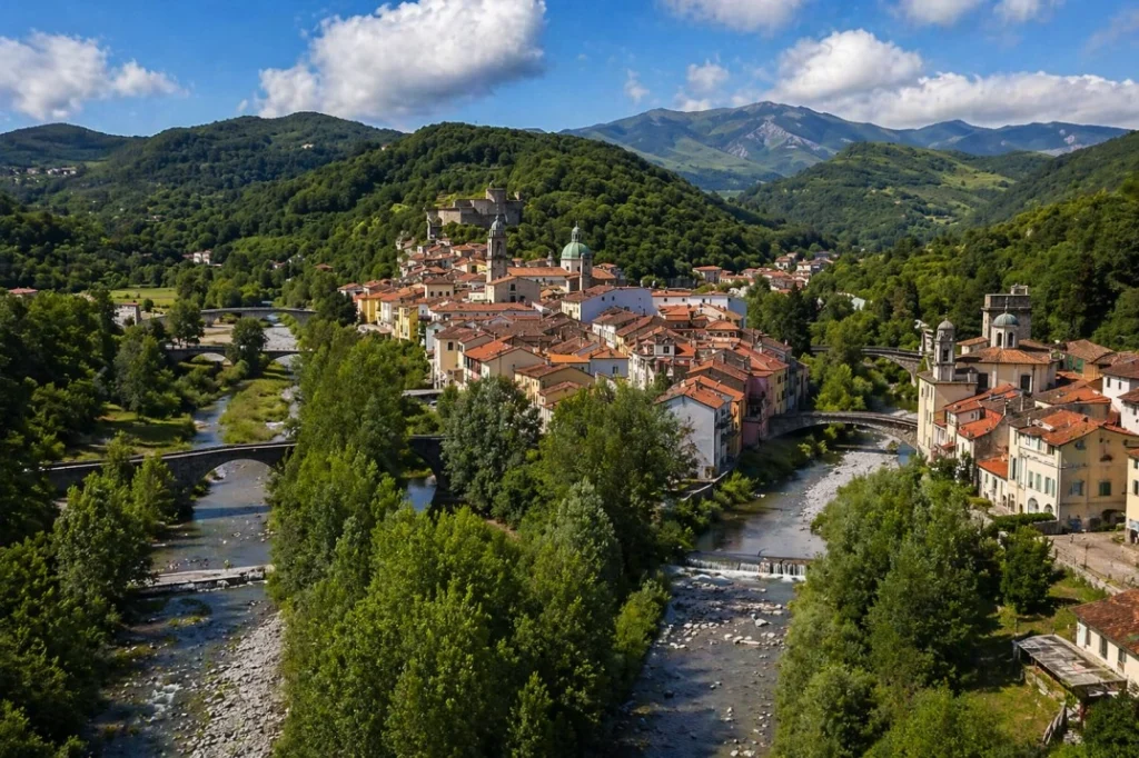 Start Working Pontremoli coliving in Lunigiana Italy with historic village, river and surrounding green hills