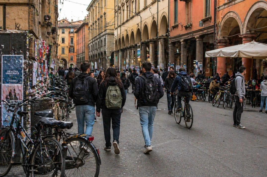 University District in Bologna, Italy – students and cyclists on a busy central street