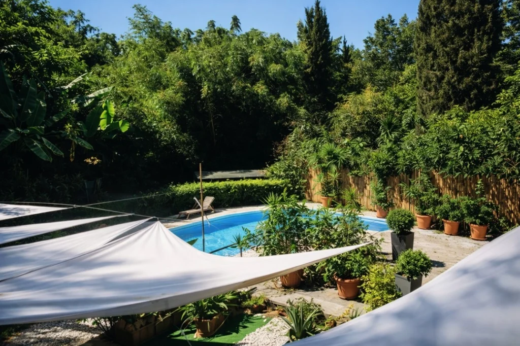 Wiki Colive Italy pool and garden area with shaded outdoor space and shared amenities